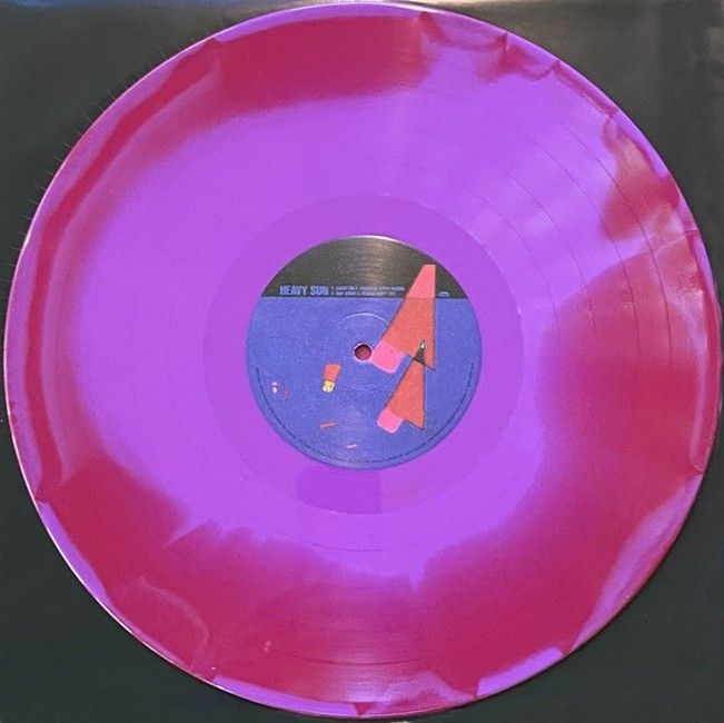 Daniel Lanois – Heavy Sun (LP, Album, Ruby Translucent Inside Opaque Orchid Vinyl)